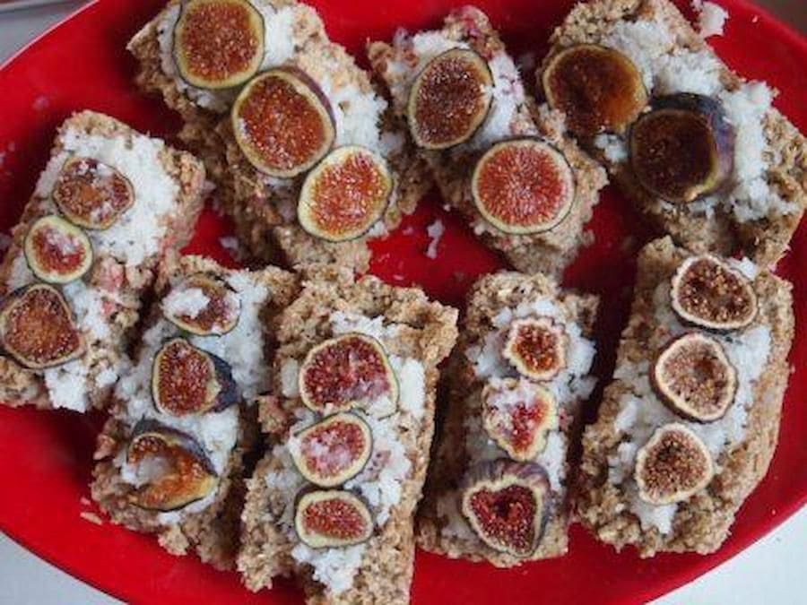 View from above of sweet pieces of cake with slices of dry figs on top at Korogonas Ark on red plateau